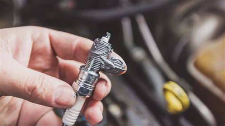 Can spark plugs cause car to jerk?