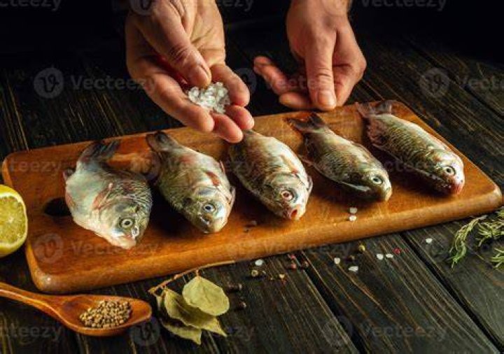 Should I salt my fish before cooking?